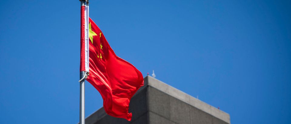 The flag of the People's Republic of China flies in the wind above the Consulate General of the People's Republic of China in San Francisco, California on July 23, 2020. - The US Justice Department announced July 23, 2020 the indictments of four Chinese researchers it said lied about their ties to the People's Liberation Army, with one escaping arrest by taking refuge in the country's San Francisco consulate. (Photo by Philip Pacheco / AFP) (Photo by PHILIP PACHECO/AFP via Getty Images)