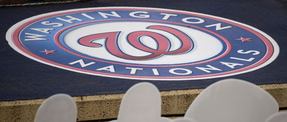 Sep 11, 2020; Washington, District of Columbia, USA; A Washington Nationals logo is seen in front of cutouts of fans in the seats during the third inning of the game between the Washington Nationals and the Atlanta Braves at Nationals Park. Mandatory Credit: Scott Taetsch-USA TODAY Sports via Reuters