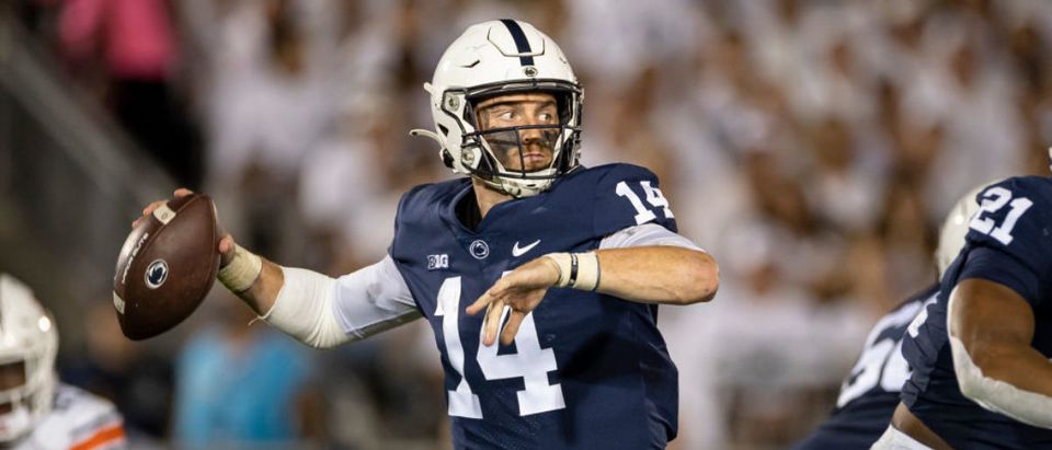 STATE COLLEGE, PA - SEPTEMBER 18: Sean Clifford #14 of the Penn State Nittany Lions looks to pass against the Auburn Tigers during the second half at Beaver Stadium on September 18, 2021 in State College, Pennsylvania. (Photo by Scott Taetsch/Getty Images)