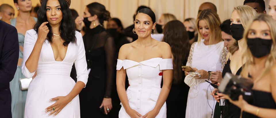 NEW YORK, NEW YORK - SEPTEMBER 13: Aurora James and Alexandria Ocasio-Cortez attend The 2021 Met Gala Celebrating In America: A Lexicon Of Fashion at Metropolitan Museum of Art on September 13, 2021 in New York City. (Photo by Mike Coppola/Getty Images)