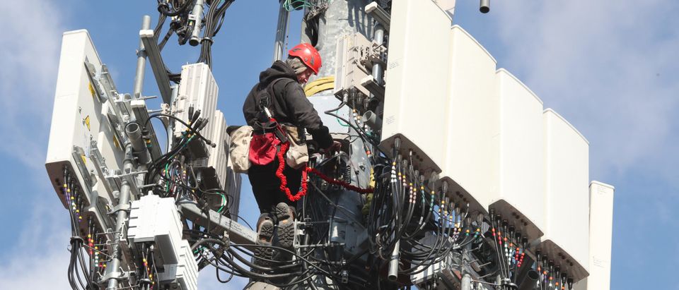 OREM, UT - NOVEMBER 26: A worker rebuilds a cellular tower with 5G equipment for the Verizon network on November 26, 2019 in Orem, Utah. The new 5G networks that are coming soon, will be 10x faster than the old 4G networks. (Photo by George Frey/Getty Images)