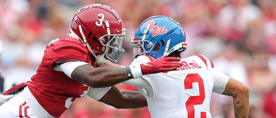TUSCALOOSA, ALABAMA - OCTOBER 02: Daniel Wright #3 of the Alabama Crimson Tide pressures Matt Corral #2 of the Mississippi Rebels during the first half at Bryant-Denny Stadium on October 02, 2021 in Tuscaloosa, Alabama. (Photo by Kevin C. Cox/Getty Images)