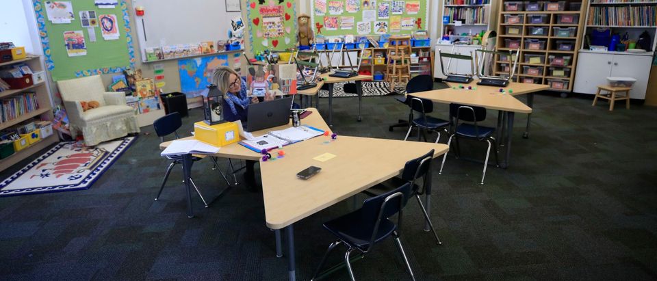 Teacher Instructs Remotely From Empty Classroom
