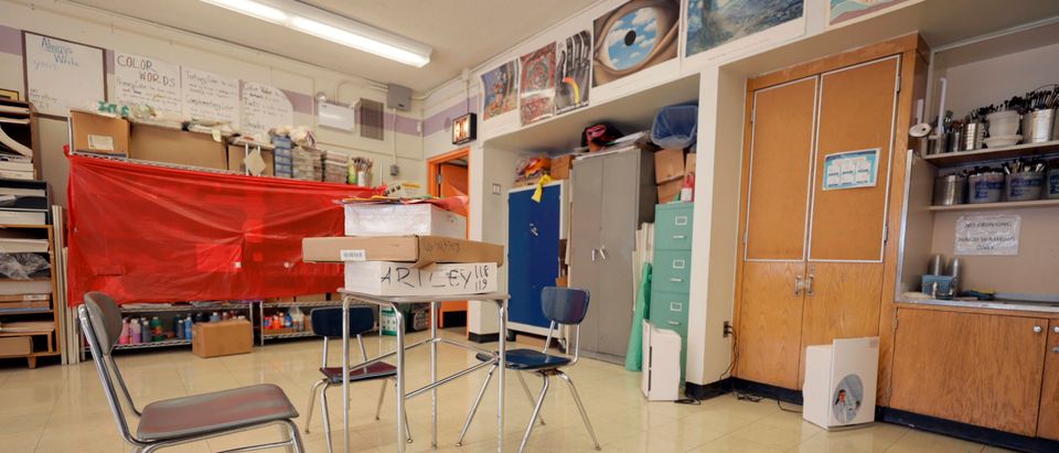 An empty classroom at Yung Wing School P.S. 124 shows that a teacher has prepared for the start of the school year on September 02, 2021 in New York City. All NYC public school students will return to in-person classes this month for the 2021-2022 school year, except for when COVID-positive kids must quarantine at home. Surveillance testing will be conducted every other week in each school building and will randomly test 10 percent of all students whose parents have consented. (Photo by Michael Loccisano/Getty Images)