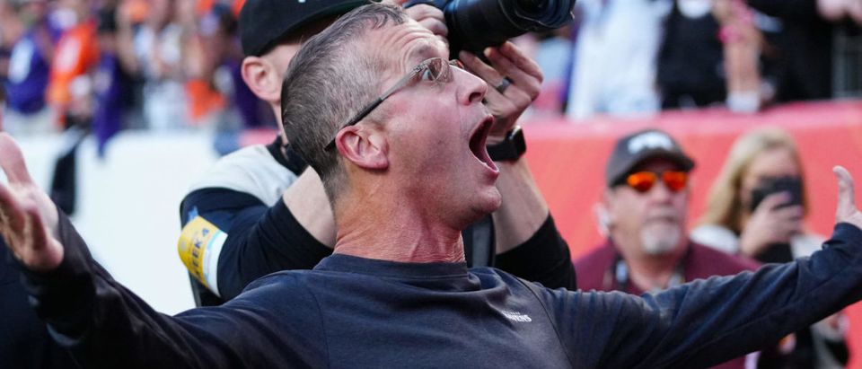 Oct 3, 2021; Denver, Colorado, USA; Baltimore Ravens head coach John Harbaugh reacts after defeating the Denver Broncos at Empower Field at Mile High. Mandatory Credit: Ron Chenoy-USA TODAY Sports via Reuters