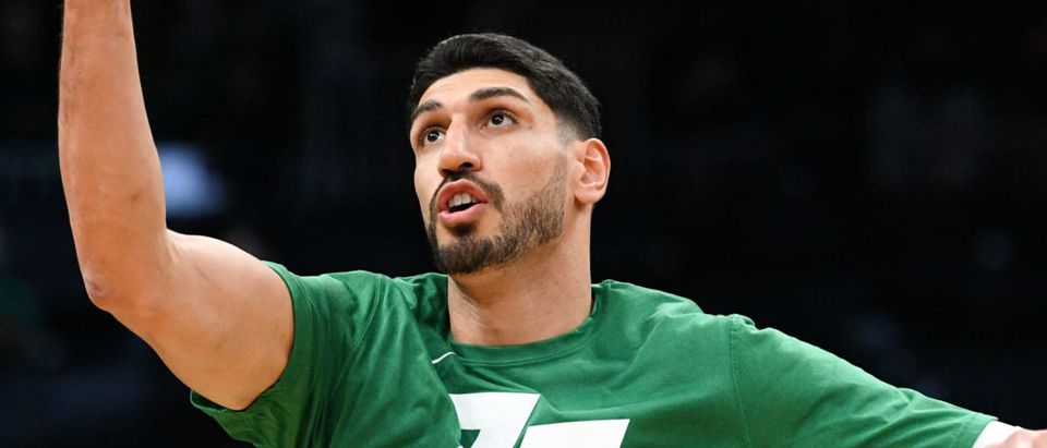 Oct 22, 2021; Boston, Massachusetts, USA; Boston Celtics center Enes Kanter (13) rebounds the ball during warmups before a game against the Toronto Raptors at the TD Garden. Mandatory Credit: Brian Fluharty-USA TODAY Sports via Reuters