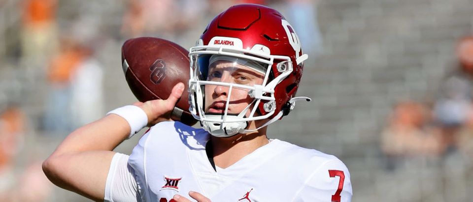 Oct 9, 2021; Dallas, Texas, USA; Oklahoma Sooners quarterback Spencer Rattler (7) warms up before the game against the Texas Longhorns at the Cotton Bowl. Mandatory Credit: Kevin Jairaj-USA TODAY Sports via Reuters