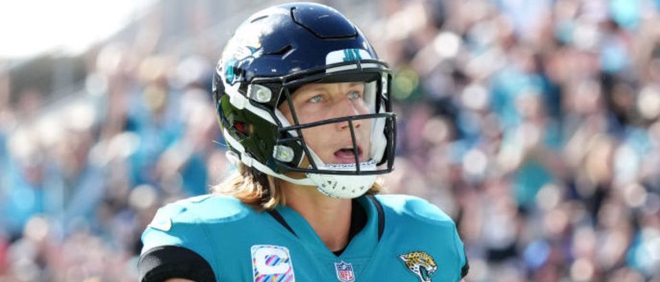 JACKSONVILLE, FLORIDA - OCTOBER 10: Trevor Lawrence #16 of the Jacksonville Jaguars celebrates after scoring a touchdown against the Tennessee Titans during the fourth quarter at TIAA Bank Field on October 10, 2021 in Jacksonville, Florida. (Photo by Mark Brown/Getty Images)