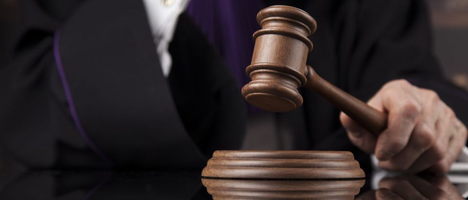 Courtroom judge [Shutterstock/Sebastian Duda]