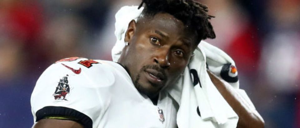 FOXBOROUGH, MASSACHUSETTS - OCTOBER 03: Antonio Brown #81 of the Tampa Bay Buccaneers looks on against the New England Patriots during the second quarter in the game at Gillette Stadium on October 03, 2021 in Foxborough, Massachusetts. (Photo by Adam Glanzman/Getty Images)