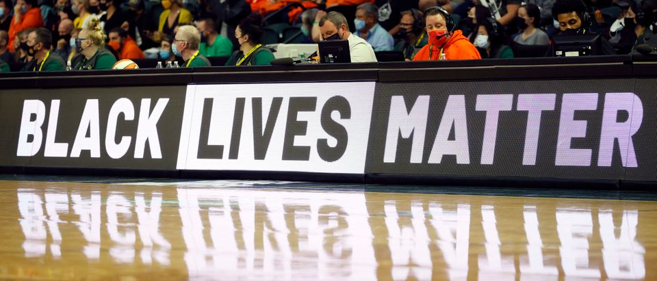 A Black Lives Matter sign is displayed on an LED board during the second quarter between the Seattle Storm and the New York Liberty at Angel of the Winds Arena on September 02, 2021 in Everett, Washington. NOTE TO USER: User expressly acknowledges and agrees that, by downloading and or using this photograph, User is consenting to the terms and conditions of the Getty Images License Agreement. (Photo by Steph Chambers/Getty Images)