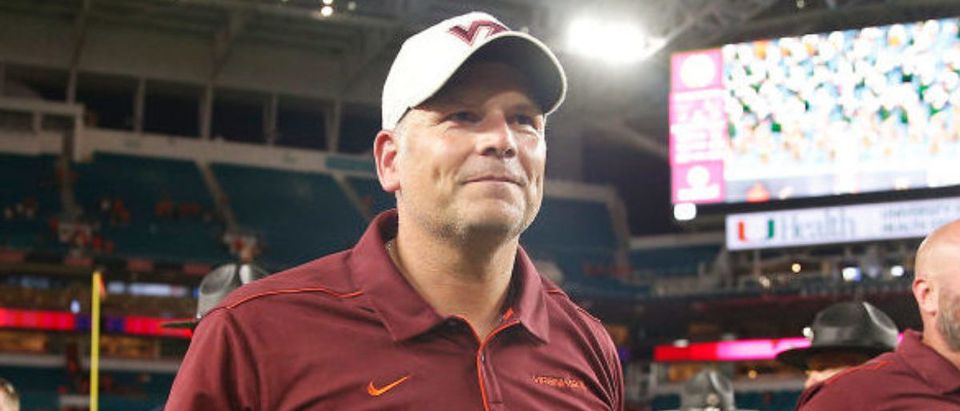 MIAMI, FLORIDA - OCTOBER 05: Head coach Justin Fuente of the Virginia Tech Hokies walks off the field after defeating the Miami Hurricanes 42-35 at Hard Rock Stadium on October 05, 2019 in Miami, Florida. (Photo by Michael Reaves/Getty Images)