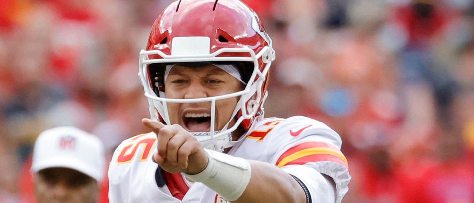 Oct 17, 2021; Landover, Maryland, USA; Kansas City Chiefs quarterback Patrick Mahomes (15) gestures at the line of scrimmage against the Washington Football Team at FedExField. Mandatory Credit: Geoff Burke-USA TODAY Sports via Reuters
