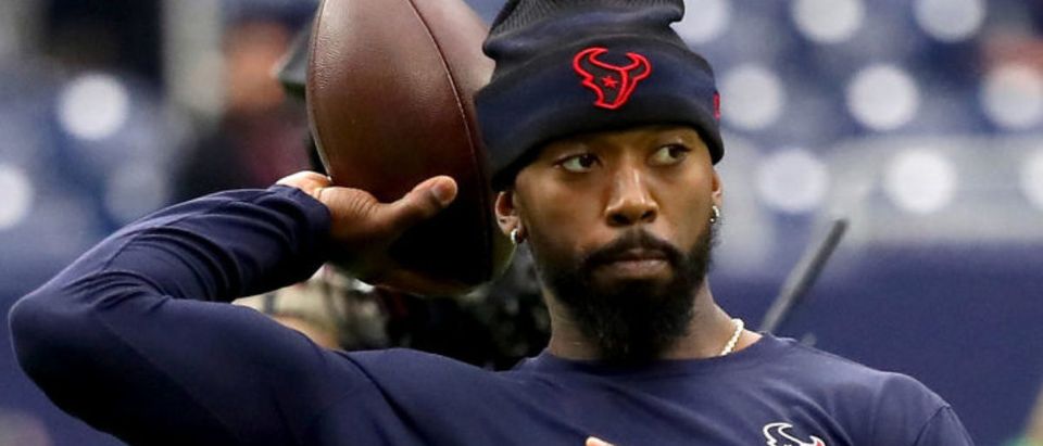 HOUSTON, TEXAS - OCTOBER 31: Tyrod Taylor #5 of the Houston Texans throws the ball during pregame warm-ups before the game against the Los Angeles Rams at NRG Stadium on October 31, 2021 in Houston, Texas. (Photo by Bob Levey/Getty Images)