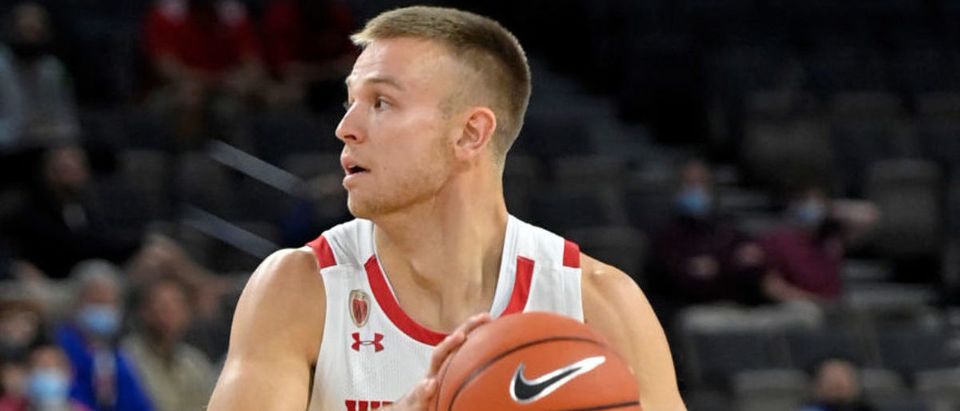 LAS VEGAS, NEVADA - NOVEMBER 22: Brad Davison #34 of the Wisconsin Badgers drives the ball against the Texas A&amp;M Aggies during the 2021 Maui Invitational basketball tournament at Michelob ULTRA Arena on November 22, 2021 in Las Vegas, Nevada. (Photo by David Becker/Getty Images)