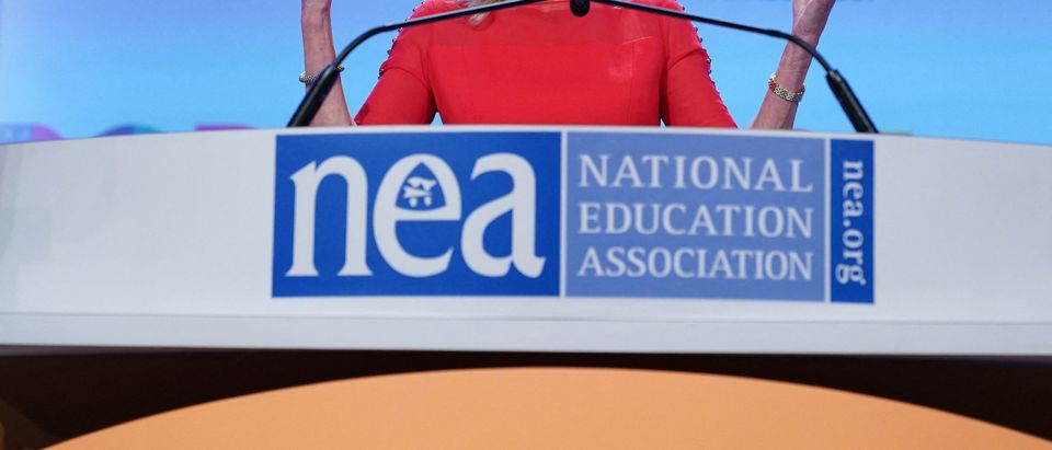 First Lady Jill Biden addresses the National Education Association's Annual Meeting and Representative Assembly in the Walter E. Washington Convention Center in Washington, DC on July 2, 2021. (Photo by MANDEL NGAN/AFP via Getty Images)