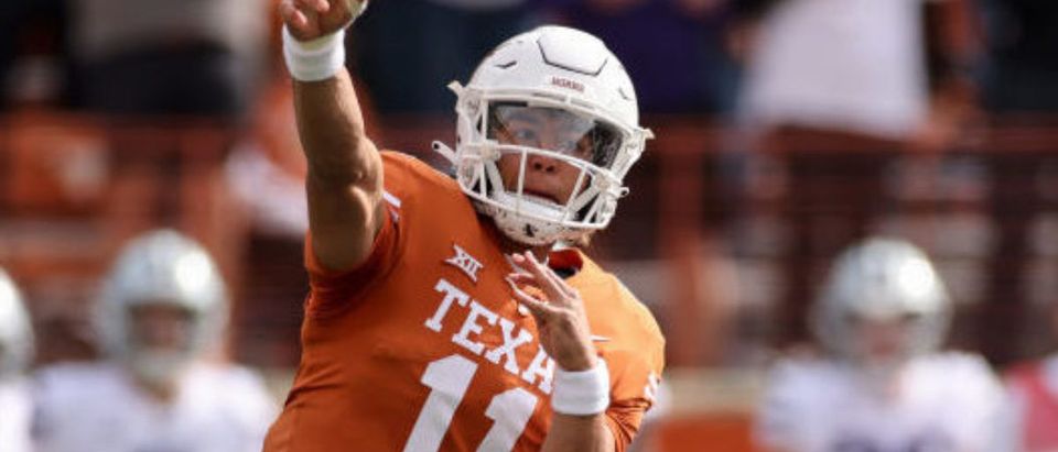 AUSTIN, TEXAS - NOVEMBER 26: Casey Thompson #11 of the Texas Longhorns throws a pass in the first quarter against the Kansas State Wildcats at Darrell K Royal-Texas Memorial Stadium on November 26, 2021 in Austin, Texas. (Photo by Tim Warner/Getty Images)