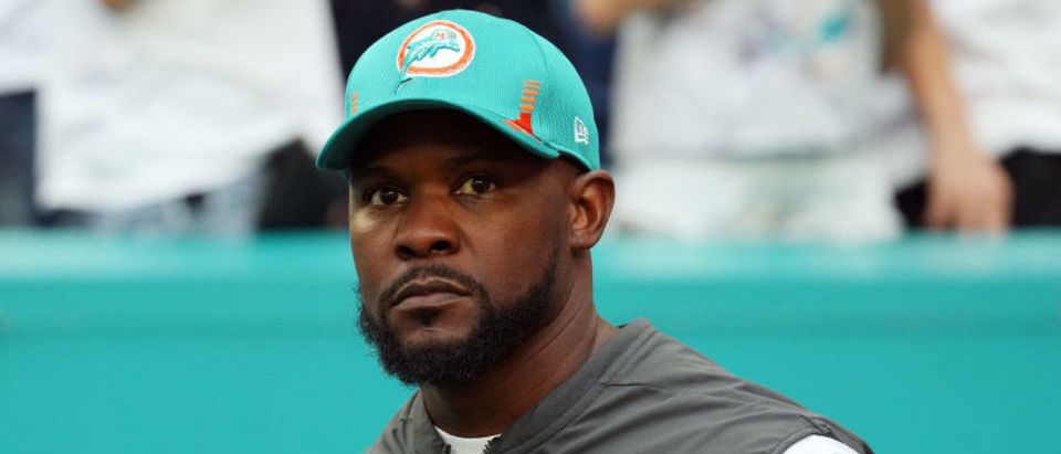 MIAMI GARDENS, FLORIDA - JANUARY 09: Head coach Brian Flores of the Miami Dolphins takes the field during introductions prior to the game against the New England Patriots at Hard Rock Stadium on January 09, 2022 in Miami Gardens, Florida. (Photo by Mark Brown/Getty Images)