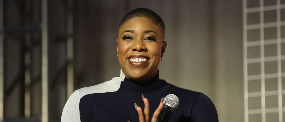 MASPETH, NY - NOVEMBER 18: Symone Sanders speaks onstage at Girlboss Rally NYC 2018 at Knockdown Center on November 18, 2018 in Maspeth, New York. (Photo by JP Yim/Getty Images for Girlboss Rally NYC 2018)