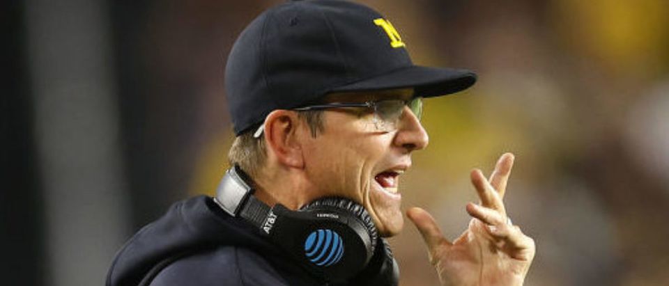 MIAMI GARDENS, FLORIDA - DECEMBER 31: Head Coach Jim Harbaugh of the Michigan Wolverines reacts on the sidelines in the first quarter of the game against the Georgia Bulldogs in the Capital One Orange Bowl for the College Football Playoff semifinal game at Hard Rock Stadium on December 31, 2021 in Miami Gardens, Florida. (Photo by Michael Reaves/Getty Images)