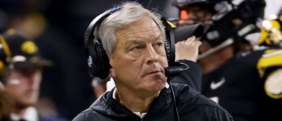 INDIANAPOLIS, INDIANA - DECEMBER 04: Head coach Kirk Ferentz of the Iowa Hawkeyes looks on in the second quarter against the Michigan Wolverines during the Big Ten Championship at Lucas Oil Stadium on December 04, 2021 in Indianapolis, Indiana. (Photo by Dylan Buell/Getty Images)