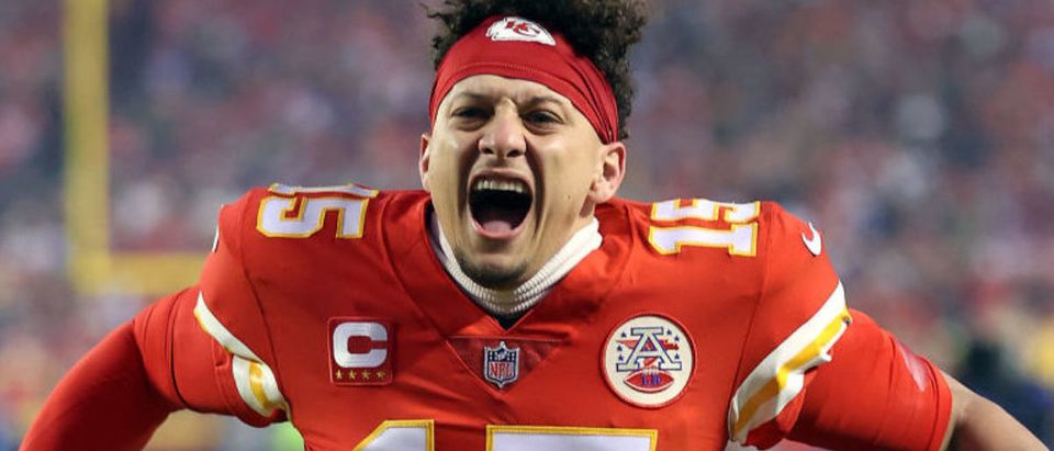 KANSAS CITY, MISSOURI - JANUARY 23: Patrick Mahomes #15 of the Kansas City Chiefs pumps up the crowd prior to the AFC Divisional Playoff game against the Buffalo Bills at Arrowhead Stadium on January 23, 2022 in Kansas City, Missouri. (Photo by Jamie Squire/Getty Images)