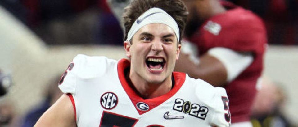 INDIANAPOLIS, INDIANA - JANUARY 10: William Mote #56 of the Georgia Bulldogs reacts after the Georgia Bulldogs defeated the Alabama Crimson Tide 33-18 in the 2022 CFP National Championship Game at Lucas Oil Stadium on January 10, 2022 in Indianapolis, Indiana. (Photo by Andy Lyons/Getty Images)