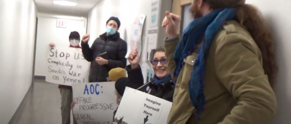 Activists gather outside the office of Rep. Alexandria Ocasio-Cortez. (Screenshot/YouTube/Activity NY)
