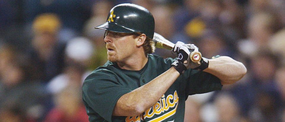 07 Apr 2002 : Jeremy Giambi #7 of the Oakland A's prepares tp bat against the Seattle Mariners during the game at Safeco Field in Seattle, Washington. The A's won 6-5. DIGITAL IMAGE. Mandatory Credit: Otto Greule/Getty Images