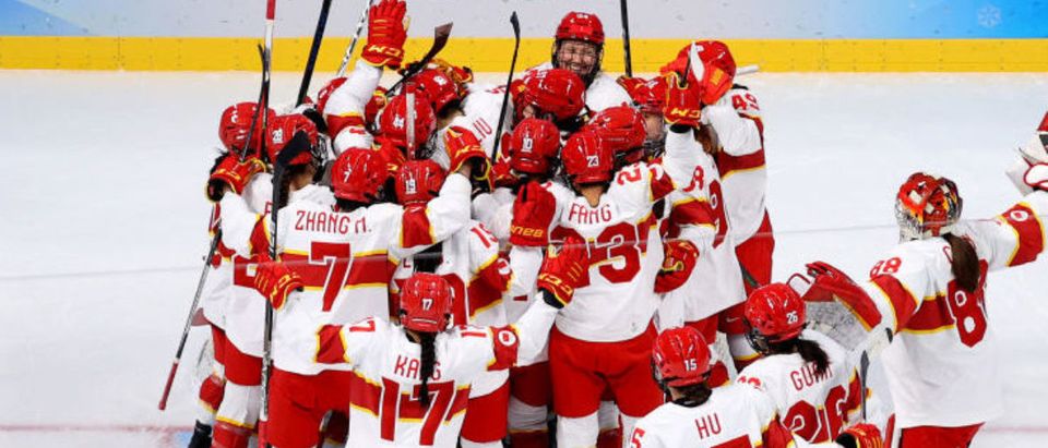 BEIJING, CHINA - FEBRUARY 04: Team China celebrate their win during the Women's Preliminary Round Group B match against Team Denmark at Wukesong Sports Centre on February 04, 2022 in Beijing, China. (Photo by Harry How/Getty Images)
