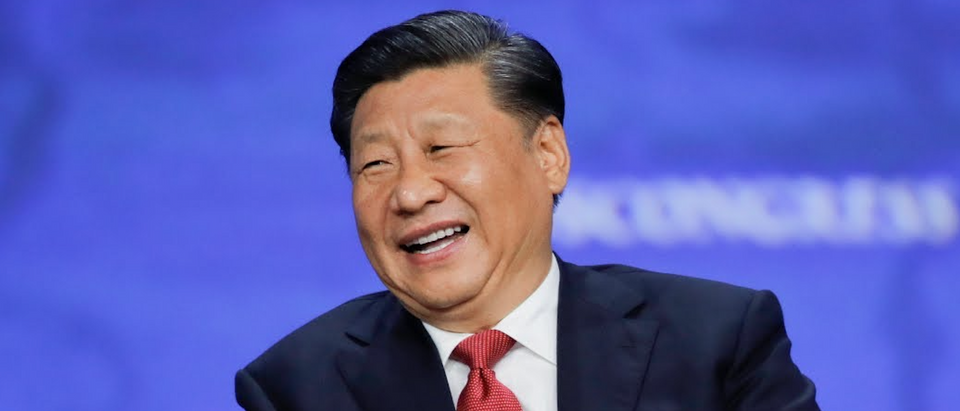 Secretary General of the Chinese Community Party Xi Jinping laughing.