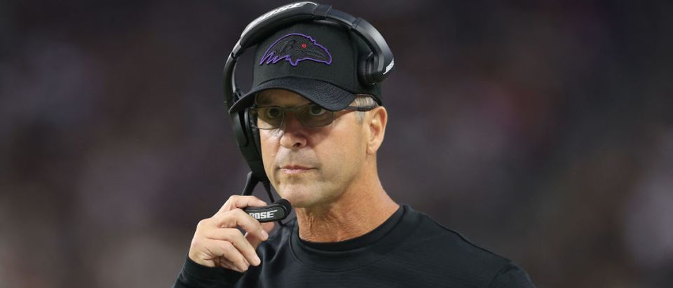 LAS VEGAS, NEVADA - SEPTEMBER 13: Head coach John Harbaugh of the Baltimore Ravens watches from the sidelines during the NFL game against the Las Vegas Raiders at Allegiant Stadium on September 13, 2021 in Las Vegas, Nevada. The Raiders defeated the Ravens 33-27 in overtime. (Photo by Christian Petersen/Getty Images)