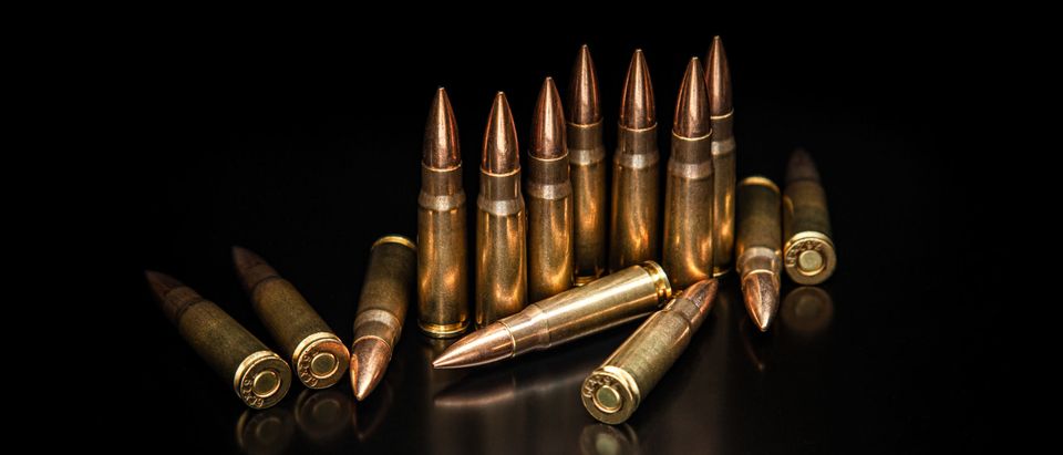 Bullet,Isolated,On,Black,Background,With,Reflexion.,Rifle,Bullets,Close-up