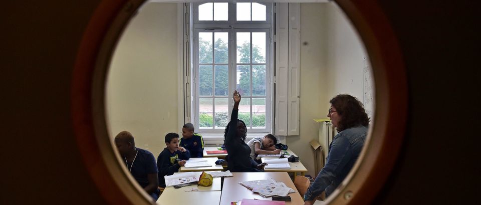 High school students attend a class at the Apprentis d'Auteuil-managed Saint-Philippe school in Meudon outside Paris on September 11, 2017. (Photo by CHRISTOPHE ARCHAMBAULT/AFP via Getty Images)