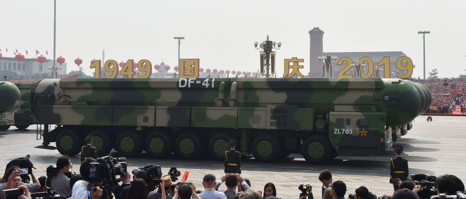 Military vehicles carry China's DF-41 nuclear-capable intercontinental ballistic missiles in a military parade at Tiananmen Square in Beijing on October 1, 2019, to mark the 70th anniversary of the founding of the People's Republic of China. (Photo by GREG BAKER / AFP) (Photo by GREG BAKER/AFP via Getty Images)