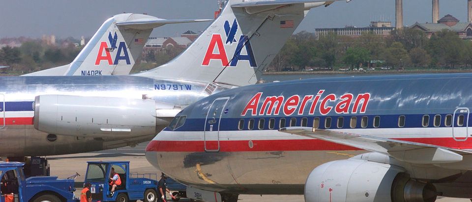 AN AMERICAN AIRLINE IS PUSHED OUT AT REAGAN NATIONAL AIRPORT.