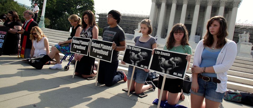 Pro-life activists rally in front of U.S. Supreme Court in Washington