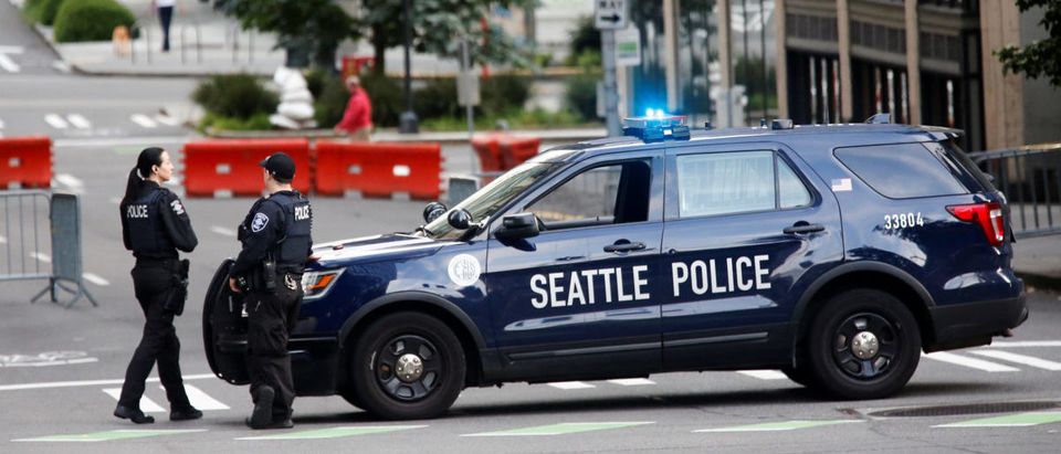 Officers at the Seattle Police Department's West Precinct in Seattle