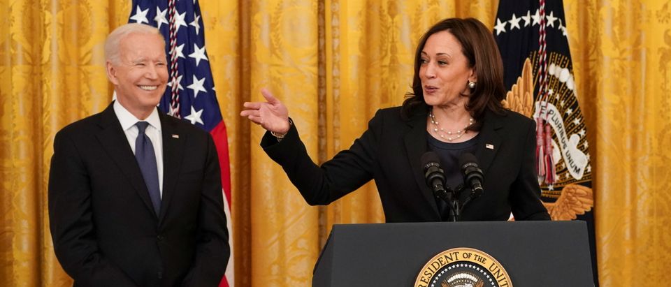 U.S. Vice President Kamala Harris speaks next to U.S. President Joe Biden before signing of COVID-19 Hate Crimes Act into law at the White House in Washington