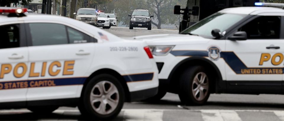 U.S. Capitol Police investigate a suspicious vehicle in front of the U.S. Supreme Court in Washington