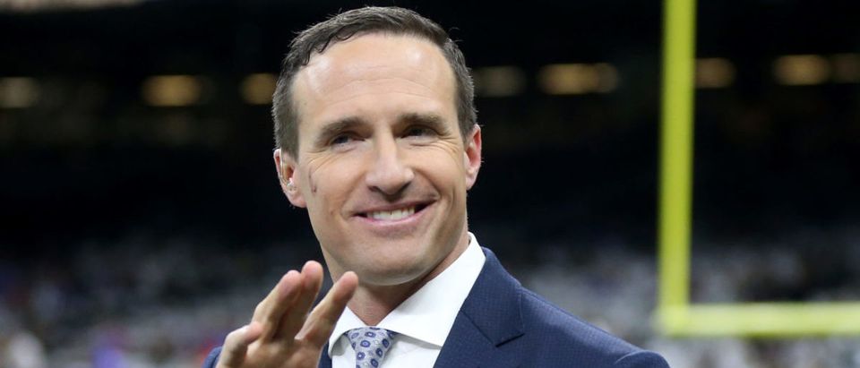 Nov 25, 2021; New Orleans, Louisiana, USA; Former New Orleans Saints quarterback Drew Brees waves to fans on the sidelines before the game between the New Orleans Saints and the Buffalo Bills at the Caesars Superdome. Mandatory Credit: Chuck Cook-USA TODAY Sports via Reuters