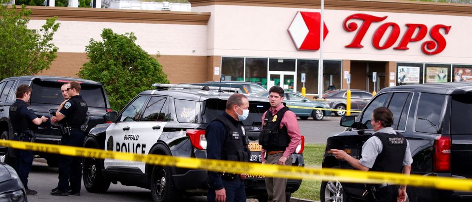 FILE PHOTO: Police officers secure the scene after a shooting at TOPS supermarket in Buffalo