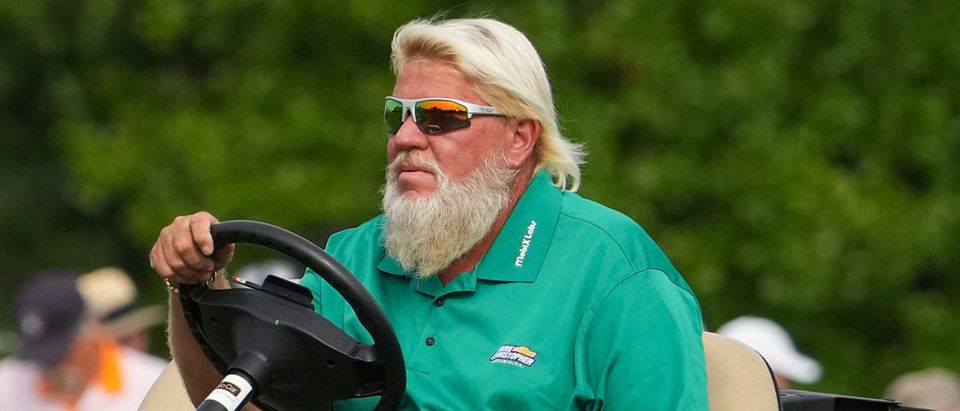 May 19, 2022; Tulsa, Oklahoma, USA; John Daly drives his golf cart during the first round of the PGA Championship golf tournament. Mandatory Credit: Michael Madrid-USA TODAY Sports via Reuters