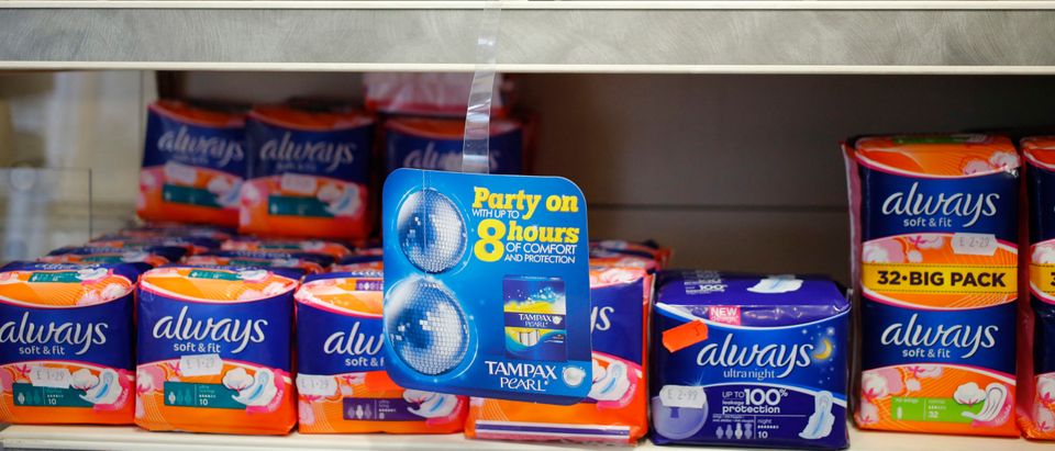 Feminine hygiene products are seen in a pharmacy in London