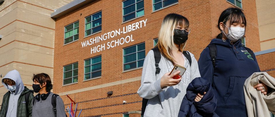 Students leave Washington-Liberty High School in Arlington, Virginia