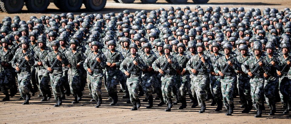 Soldiers of China's People's Liberation Army (PLA) get ready for the military parade to commemorate the 90th anniversary of the foundation of the army at Zhurihe military training base in Inner Mongolia Autonomous Region, China, July 30, 2017. (China Daily via REUTERS)