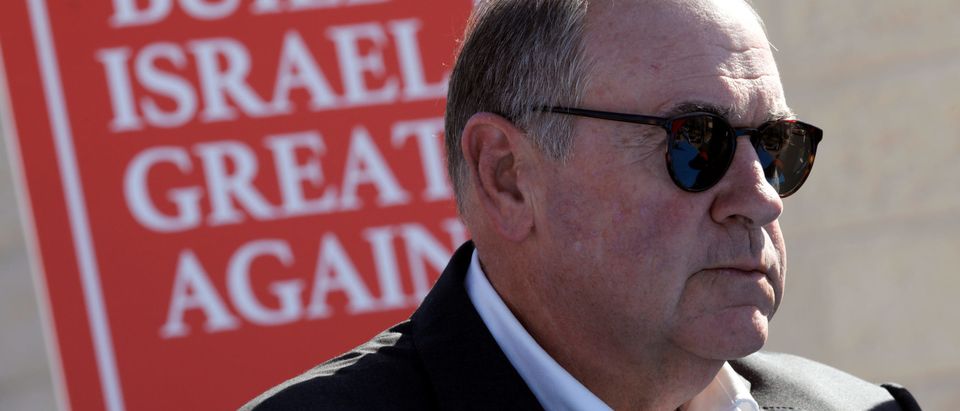 Former Arkansas Governor Huckabee attends a ceremony marking the construction of a new housing complex in the Israeli settlement of Efrat in the occupied West Bank