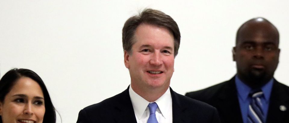 U.S. Supreme Court nominee Brett Kavanaugh arrives for a meeting on Capitol Hill in Washington