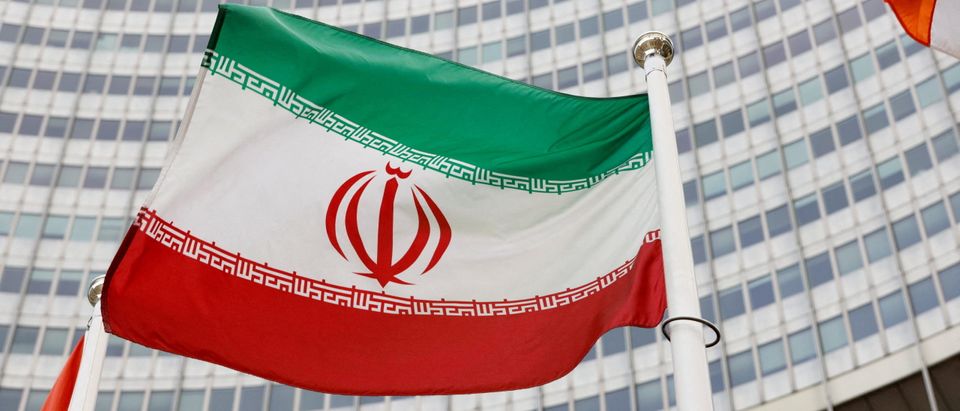 FILE PHOTO: The Iranian flag waves in front of the International Atomic Energy Agency (IAEA) headquarters, in Vienna