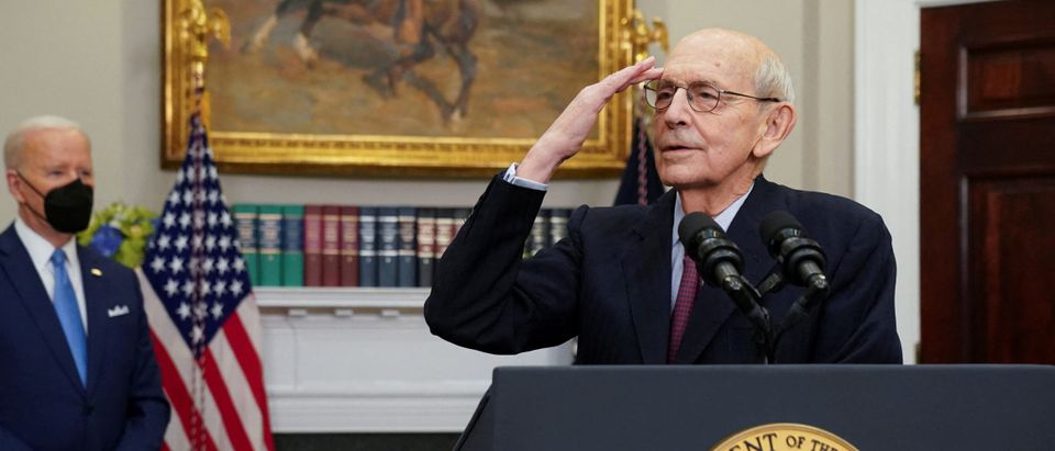 FILE PHOTO: U.S. Supreme Court Justice Stephen Breyer gestures, while President Joe Biden looks on, as Breyer announces he will retire at the end of the court's current term, at the White House in Washington, U.S., January 27, 2022. REUTERS/Kevin Lamarque/File Photo